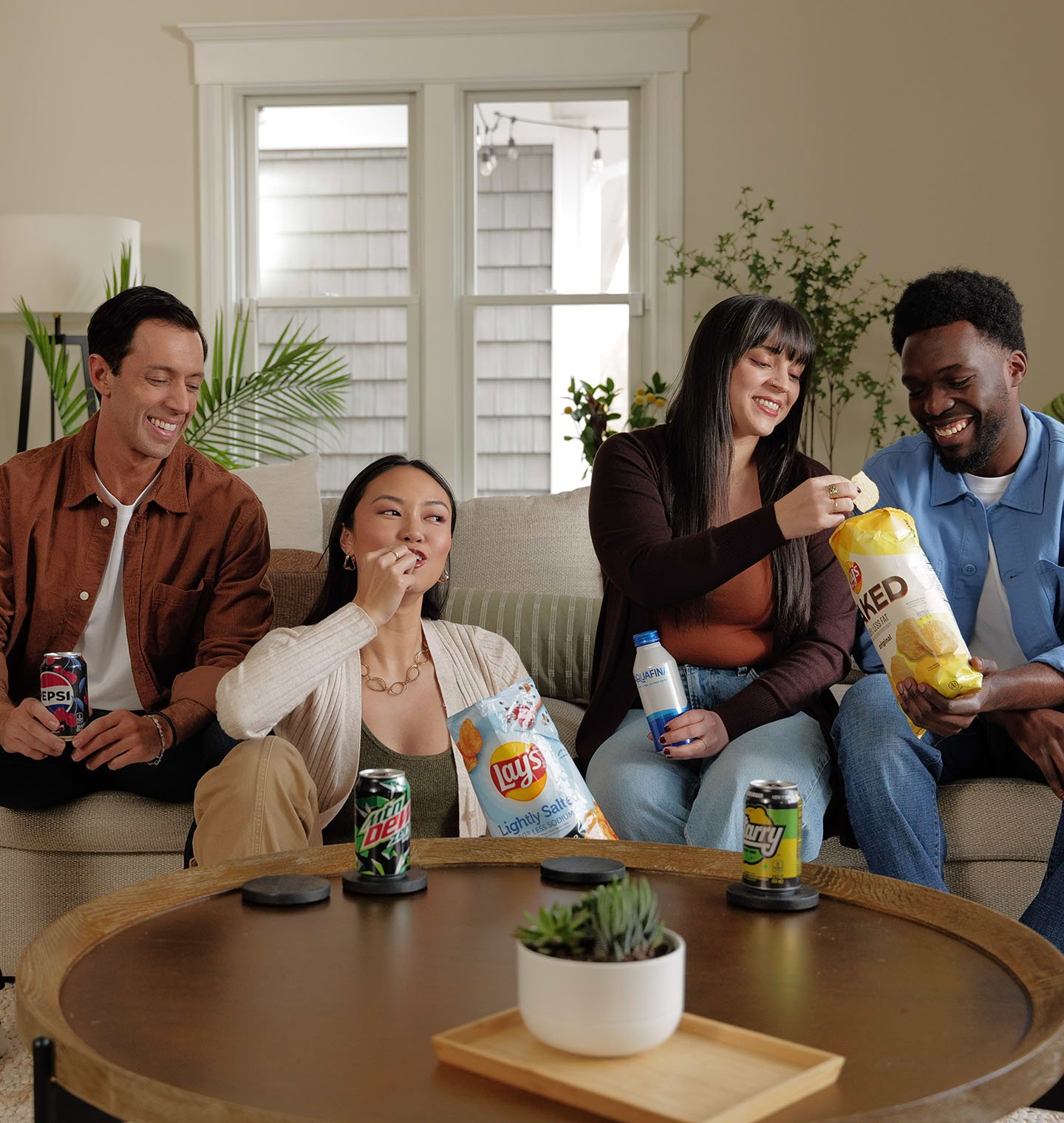 Friends enjoying a variety of PepsiCo products together