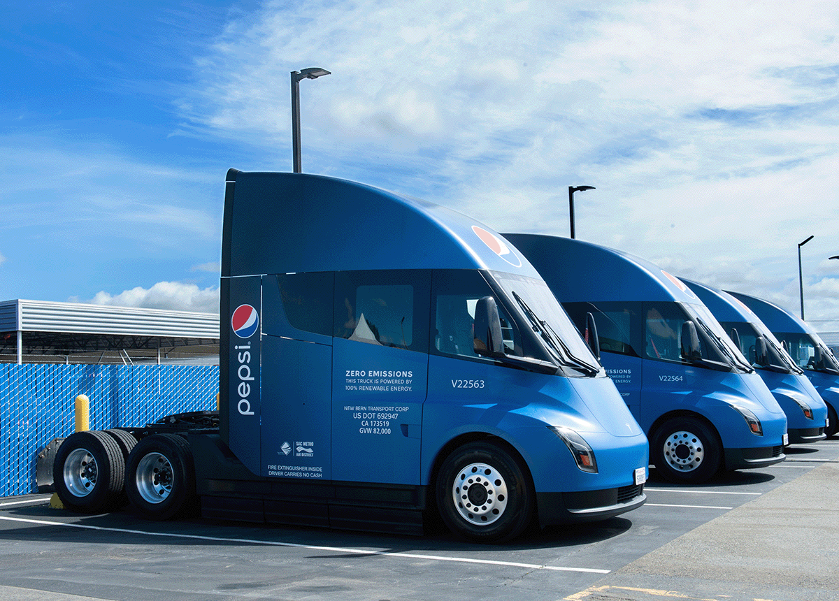 Line of Pepsi Tesla trucks