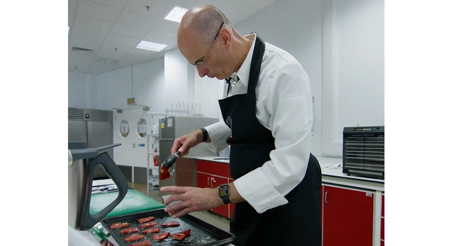 Pat Clifford cooking in one of PepsiCo's kitchens