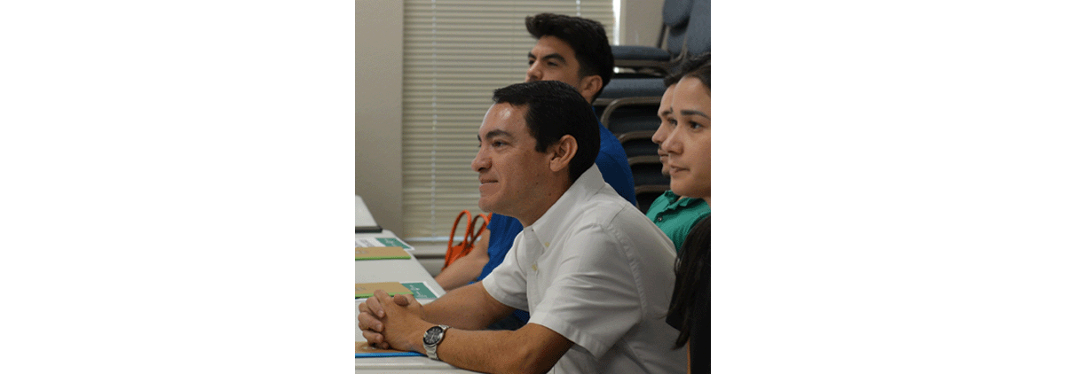 Vicente and colleagues sitting behind a table